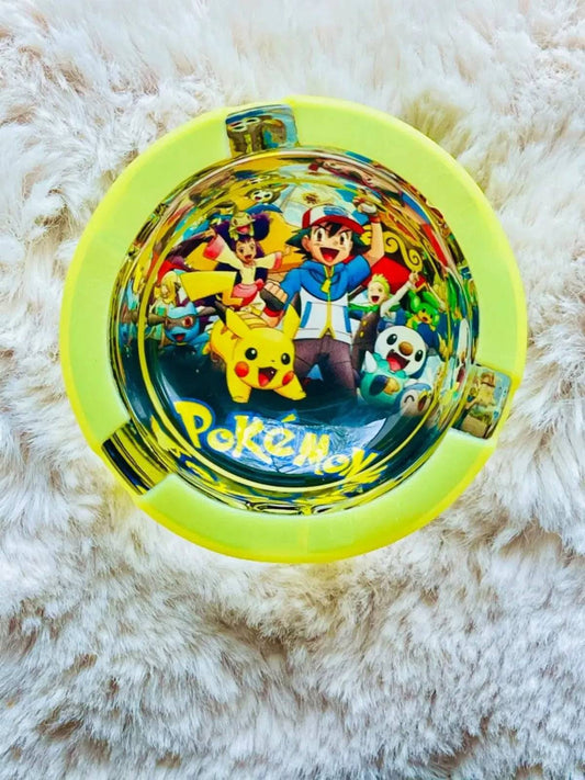 Pokémon-themed ashtray by Certified Puffs featuring colorful Pokémon characters on ceramic surface.