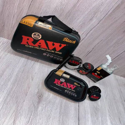 Black Raw 6-in-1 Juice Bong gift set from Certified Puffs featuring multiple attachments and accessories for versatile use.