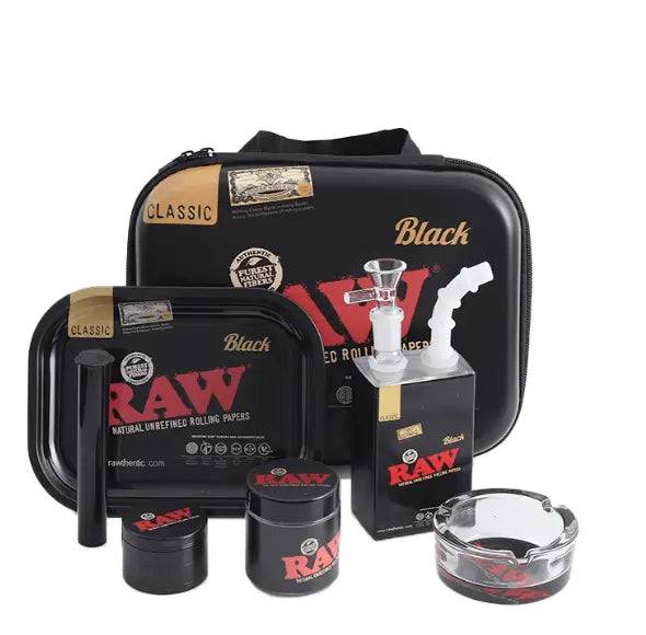 Black Raw 6-in-1 Juice Bong gift set by Certified Puffs featuring a sleek glass bong with multiple accessories for versatile use.