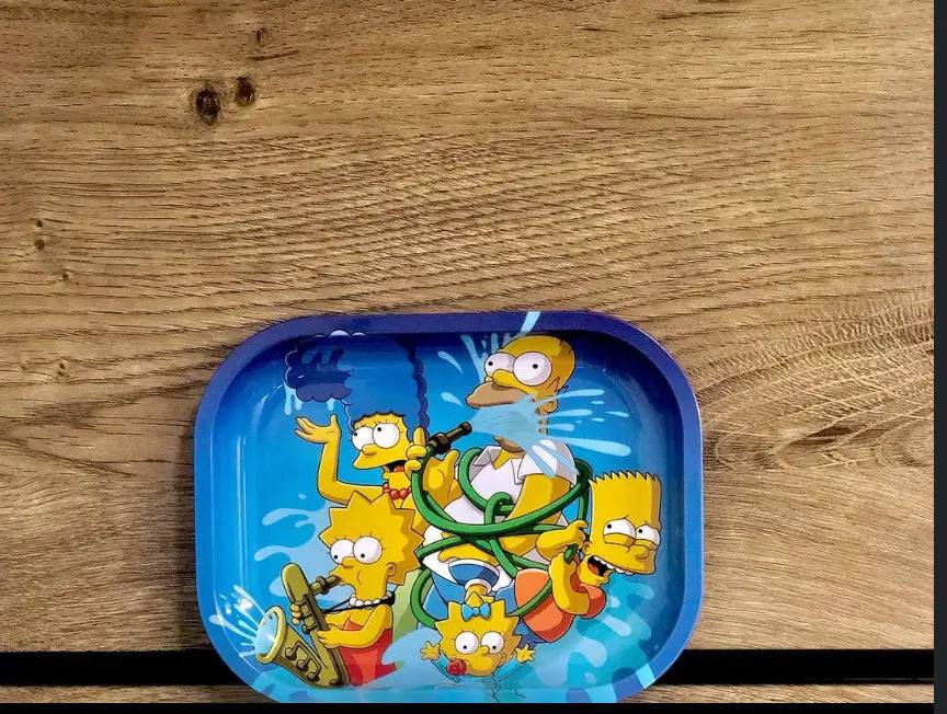 Simpsons-themed metal rolling tray with magnetic lid by Certified Puffs, featuring colorful Simpsons characters and vibrant design.
