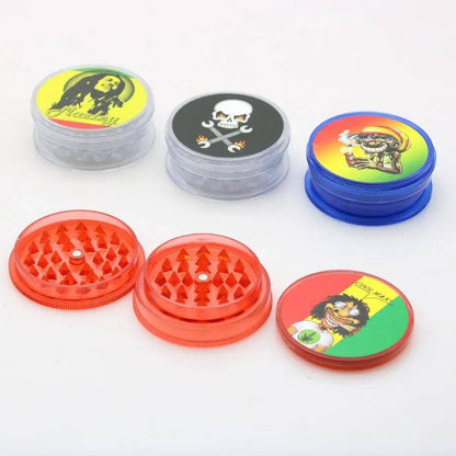 Plastic herb grinder with 60mm diameter, branded Certified Puffs, showing the top view with four grinding chambers and textured surface.
